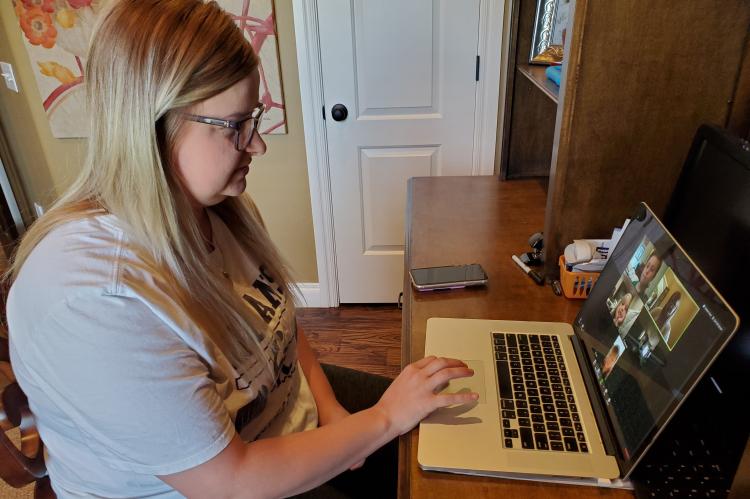Erin Wiewel conducts her final online chat with her students
