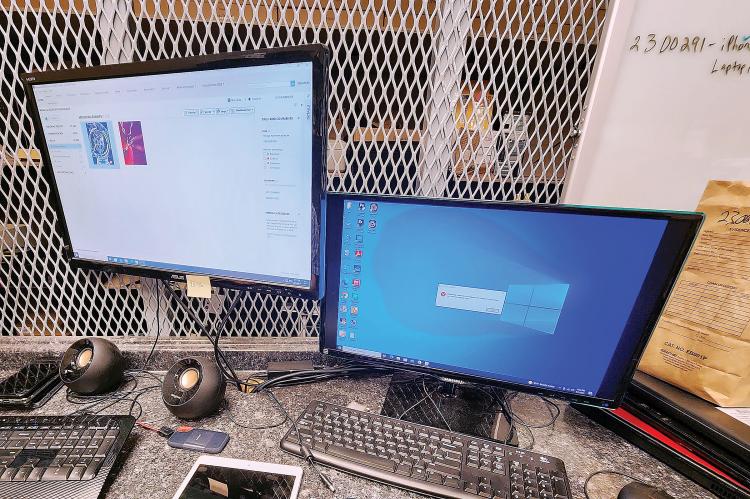 A tablet and cell phone being unlocked and contents collected