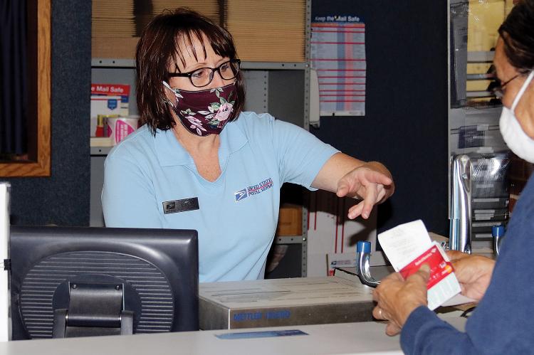 Bright wears a homemade mask
