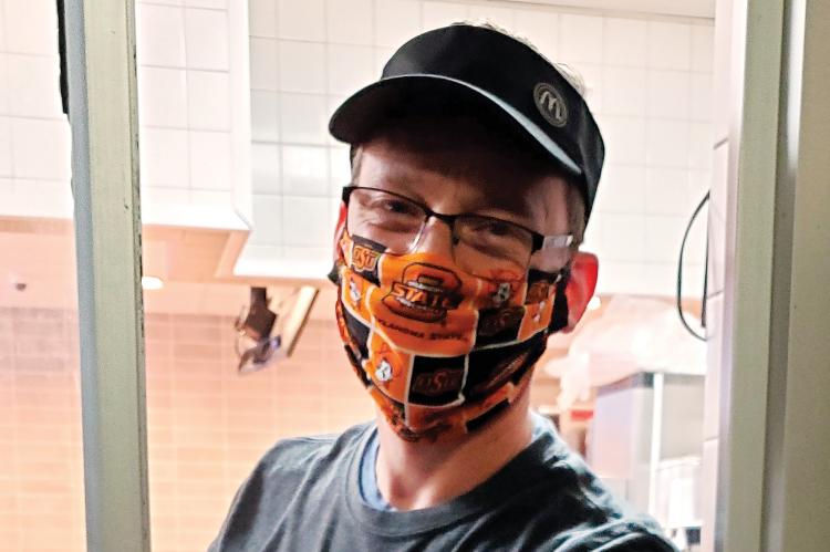Fryar was sporting face mask and wearing gloves to help prevent the spread of COVID-19