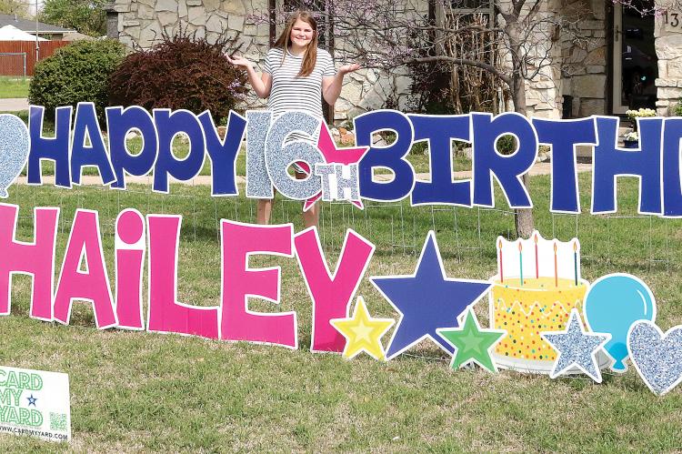 McBroom was surprised by this yard sign on her 16th birthday