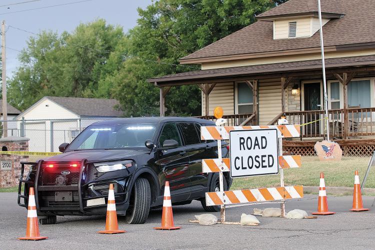 El Reno police cruiser is helping block access to Choctaw Street