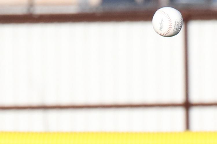 Bennet Yell tosses the ball toward a teammate