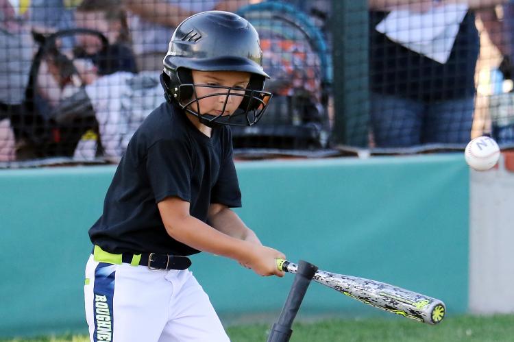 Mason Black connects with the baseball