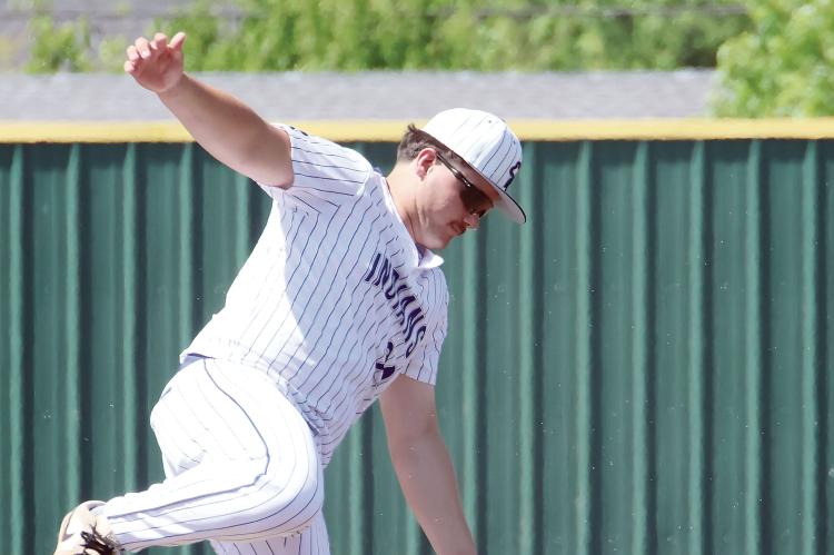 Jonathan Shelley tries to knock down a pickoff throw to second base