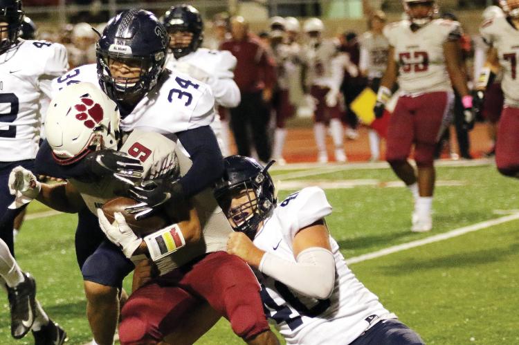 EHS football_Two tackle