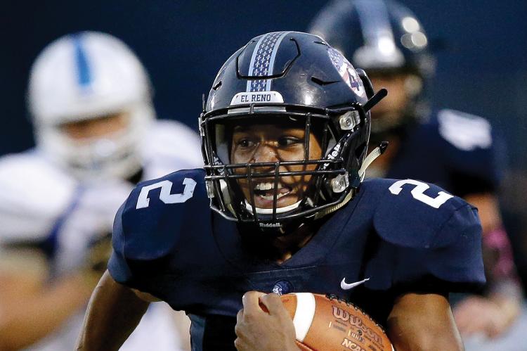 EHS football_Plumley breaks loose