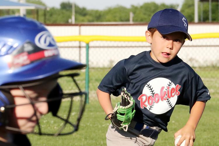 Kaden Evans tries to chase down a base runner