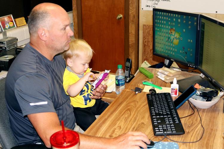 Elliott Robertson scans over the list of users on ERPS WiFi