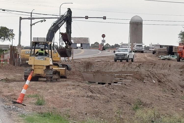 Road work crews can be seen replacing the bridge over Purcell Creek near the Banner Rd./Hwy 66 intersection