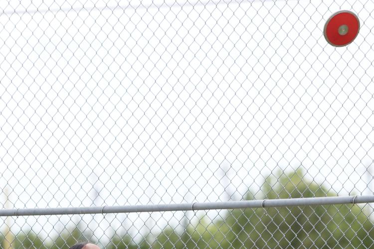 Mya Robles lets loose of a throw in discus