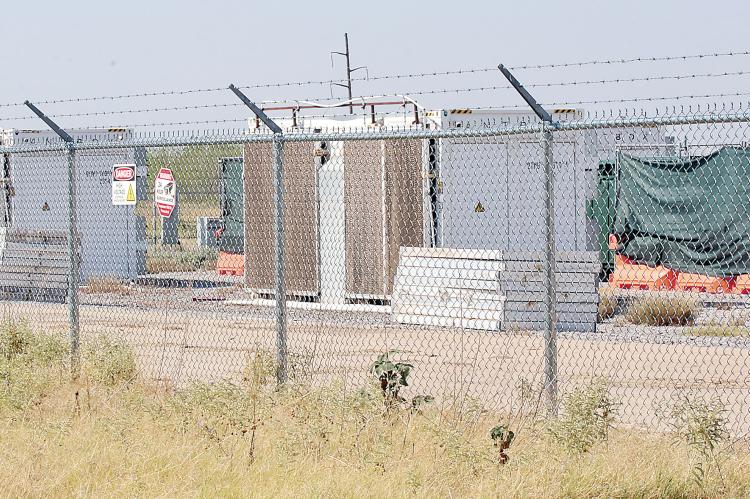 Pictured are several Bitcoin mining containers located on the property at 801 West Jensen Road