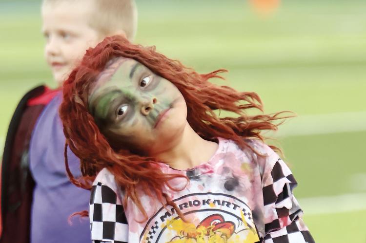Jasper Baum is decked out in zombie makeup and costume