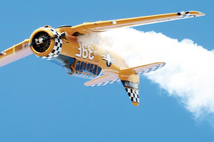 Jeff Shetterly flies his T-6 Texan into an inverted loop