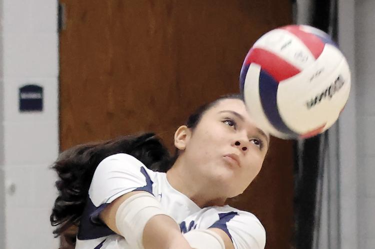 El Reno spikers ousted_story