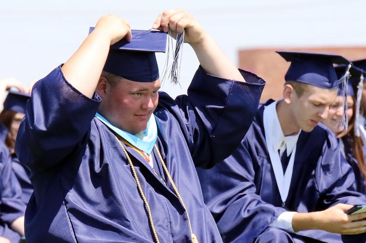Rafe Goucher switches his tassel