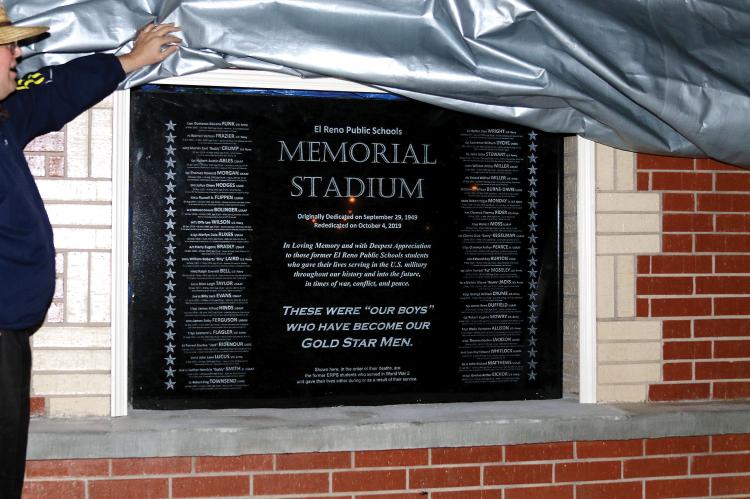 Rukes looking at memorial