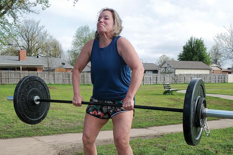 Barnes pulls up weights during workout