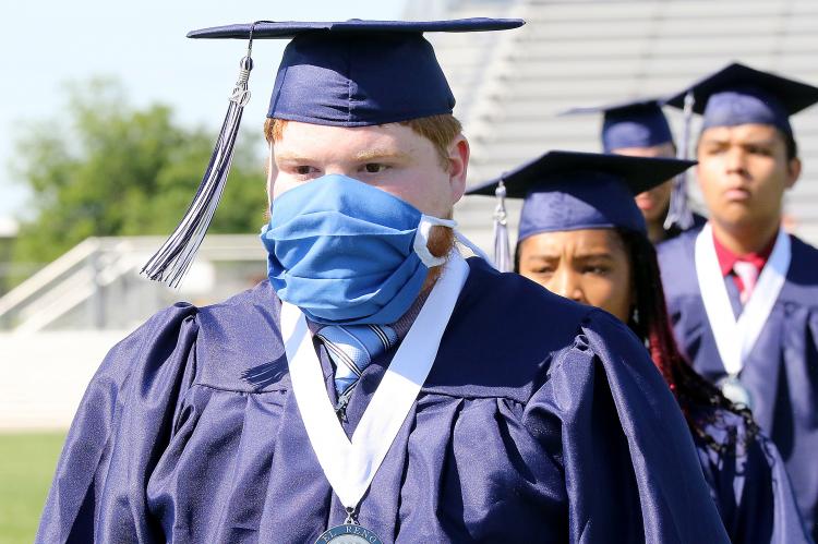 Zachary Wikel wears a mask during practice