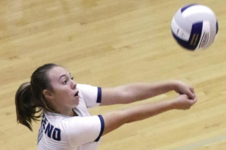 El Reno High School junior Riley Connor picks up an opponent’s serve during the recent El Reno Invitational. Connor had four aces in the win over Tuttle.