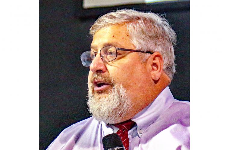 Associate District Judge Bob Hughe