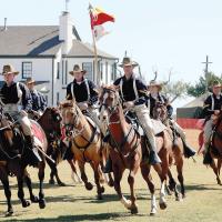 Members from the famed 11th Armored Cavalry Regiment ride in formation