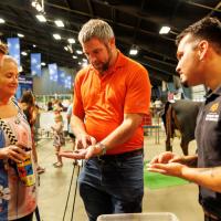 Wyatt Hoback and his student, Rodrigo Soares spent time sharing their research on dung beetles at the Oklahoma State Fair 
