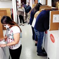Voters mark their ballots during last week’s general election