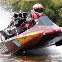 Robert Leas catches air under his boat while flying off the starting line