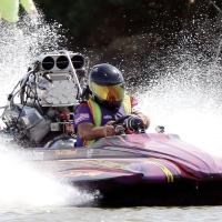 David Wehunt drives through a water spray