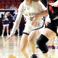 Reagan Bugaj dribbles past a Tahlequah defender