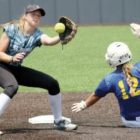 Iliana Ashford reaches out to snag a pickoff throw