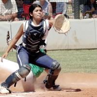 Sarah Hernandez eyes a throw to the plate