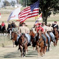 Competitors in the 2024 U.S. Cavalry Association competition take part in the Honor Ride