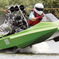 Smoky Freeman of Henryetta attempts to keep his boat level