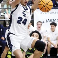 Tre Davis logs one of his three slam dunks