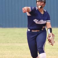 Taylor Acosta makes a throw toward first base