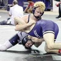 Matthew Snyder works the upper body of Guthrie’s Luke Lyons