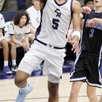 Jacob Nichols shoots a fastbreak layup