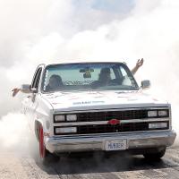 Aiden Ellington gets the wheels on his Chevy pickup churning out plumes of smoke