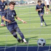 Diego Reyes shoots a penalty kick