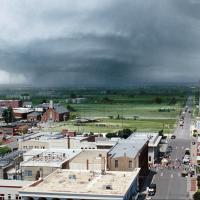 A scene from Twisters depicting a large tornado headed for downtown El Reno