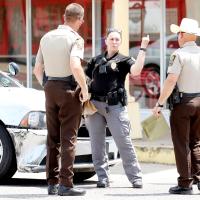 Officer from Okarche PD talks with Canadian County deputies