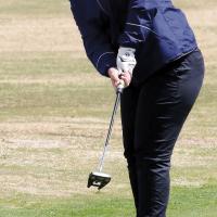 Madison Patswald watches a putt