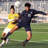 Kenneth Solis screens off a Midwest City player