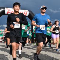 Runners in the 5K Bun Run take off from the starting line