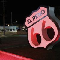 A nighttime photo of the Route 66 monument