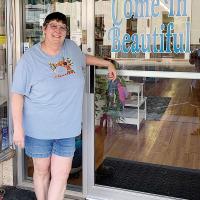 MaCrae Putnam stands in front of her downtown El Reno business