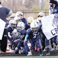 El Reno’s 6-and-under team stumbles while running through the banner