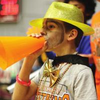 Brynston Fletcher uses a safety cone as a yelling device